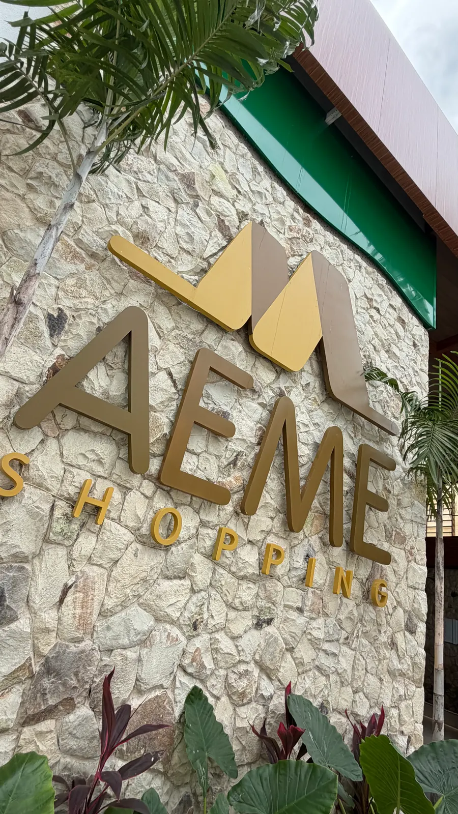 AEME Shopping — letra caixa dourada Arte Final Brasil
